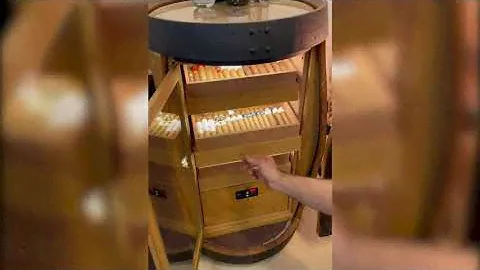 Taking out a Cigar - Humidor Barrel